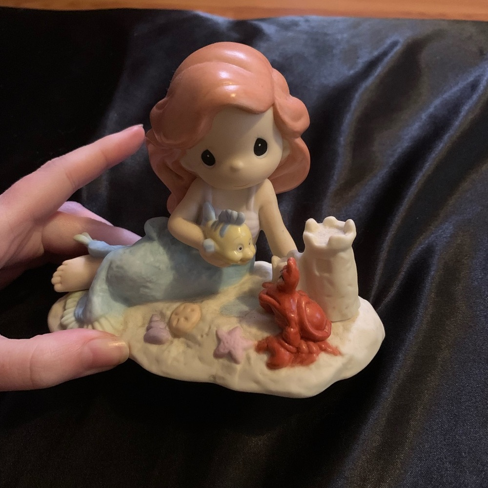 Part of your world precious moment